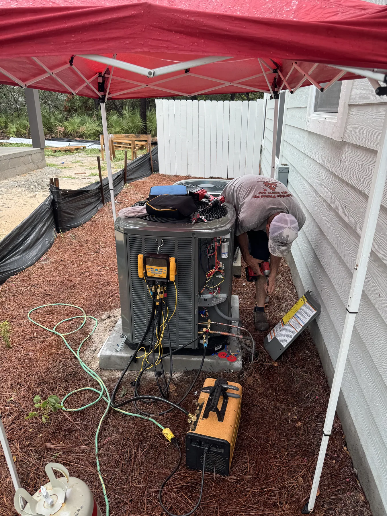 Merckle Plumbing replacing a residential air conditioning system in Freeport, Florida